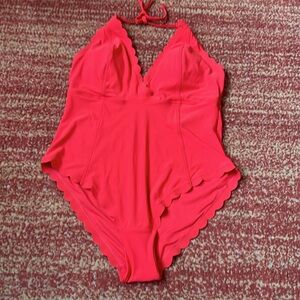 Orange one piece swimsuit. NWOT